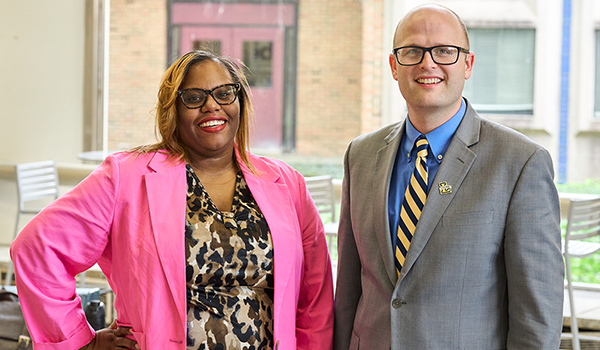 From left to right: April Lancit-Harmon, LMFT, ‘06, and Brendan Young, DSW, LSW, ‘12